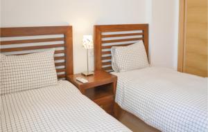 Łóżko lub łóżka w pokoju w obiekcie Nice Apartment In Alhama De Murcia