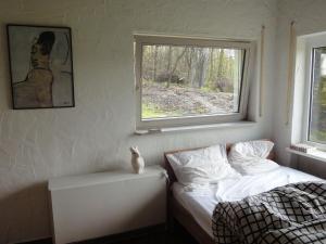 Ліжко або ліжка в номері Holiday home in Kleinich with sauna
