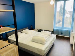 Ένα ή περισσότερα κρεβάτια σε δωμάτιο στο Appartement Calao