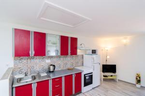 Kuchyň nebo kuchyňský kout v ubytování Apartment Jasmin