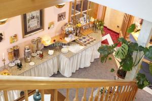 an overhead view of a counter in a kitchen with a table at Hotel Bebra's Hessischer Hof in Bebra