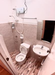 Koupelna v ubytování Kampotel Davao