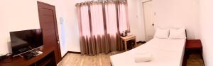 TV a/nebo společenská místnost v ubytování Kampotel Davao + 9 fotografií