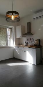 Cuisine ou kitchenette dans l'établissement AMARE MATERA comfortable rooms