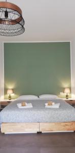 Posteľ alebo postele v izbe v ubytovaní AMARE MATERA comfortable rooms