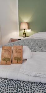 Posteľ alebo postele v izbe v ubytovaní AMARE MATERA comfortable rooms