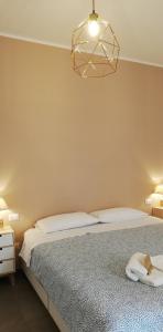 Posteľ alebo postele v izbe v ubytovaní AMARE MATERA comfortable rooms