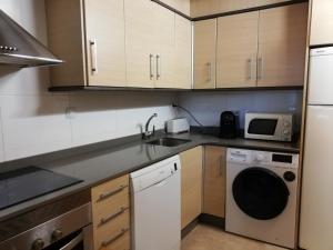 A kitchen or kitchenette at Dúplex El Cauce