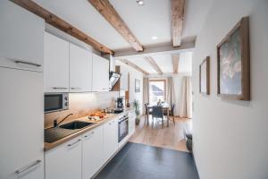 Kuchyň nebo kuchyňský kout v ubytování Gästehaus Sonne