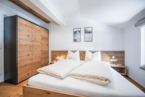 Postel nebo postele na pokoji v ubytování Gästehaus Sonne