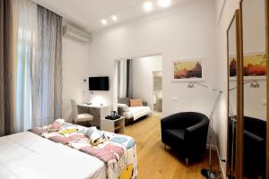 Postel nebo postele na pokoji v ubytování Sofia's Suites Guesthouse