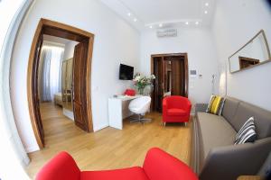 TV a/nebo společenská místnost v ubytování Sofia's Suites Guesthouse