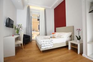 Postel nebo postele na pokoji v ubytování Sofia's Suites Guesthouse