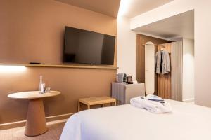 Postel nebo postele na pokoji v ubytování Novotel Paris Orly Rungis Aéroport