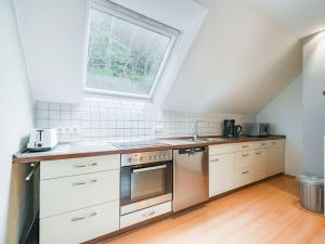 Kuchyň nebo kuchyňský kout v ubytování Premium Holiday Home in Brilon Wald near Ski Area