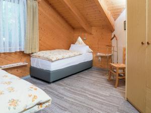 Postel nebo postele na pokoji v ubytování Ferienhaus in Loßburg in der Nähe des Skigebietes