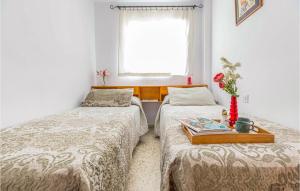 Posteľ alebo postele v izbe v ubytovaní Nice Apartment In Conil De La Frontera