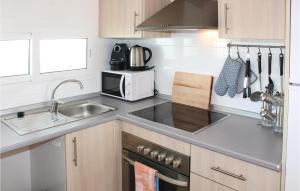 Kuchyň nebo kuchyňský kout v ubytování Pet Friendly Apartment