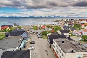 an aerial view of a small town next to the water at Andenes Sentrum Apartment in Andenes