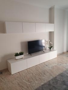 TV a/nebo společenská místnost v ubytování MARALES O Grove
