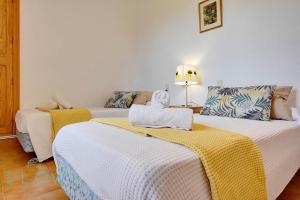 Posteľ alebo postele v izbe v ubytovaní Villa Son Guinyol by Slow Villas