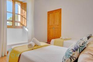 Posteľ alebo postele v izbe v ubytovaní Villa Son Guinyol by Slow Villas