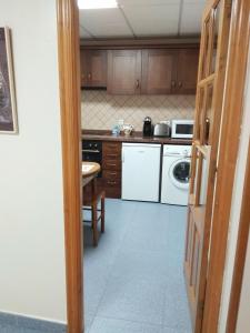 Kuchyň nebo kuchyňský kout v ubytování Apartamento Valle del Güeña