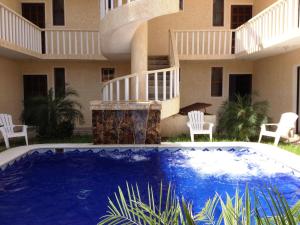 Bazén v ubytování QUINTA DIAMANTE villas&hotel nebo v jeho okolí