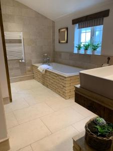 Φωτογραφία από το άλμπουμ του Dovecote Cotswold Cottages σε Chipping Norton