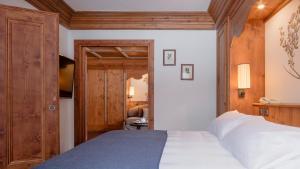 Krevet ili kreveti u jedinici u okviru objekta Faloria Mountain Spa Resort