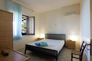 Posteľ alebo postele v izbe v ubytovaní Villa Levante vista mare Cornino