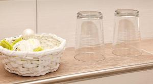 a counter with two glass jars and a basket of eggs at Pension Alpenblick in Pfronten