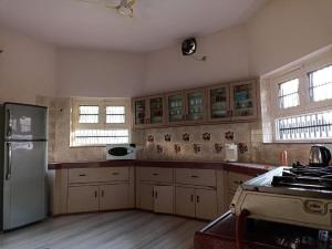 Kuchyň nebo kuchyňský kout v ubytování Happy Homestay