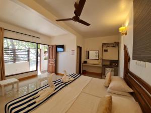 TV a/nebo společenská místnost v ubytování Liberty Guesthouse Maldives