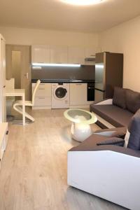 Kuchyňa alebo kuchynka v ubytovaní Útulný apartmán v centru, s krásným výhledem