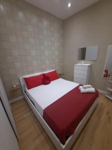 A bed or beds in a room at O Vascetiello