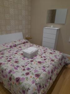 A bed or beds in a room at O Vascetiello