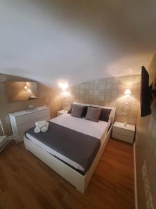 A bed or beds in a room at O Vascetiello