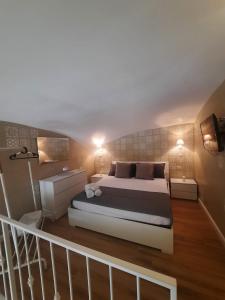 A bed or beds in a room at O Vascetiello