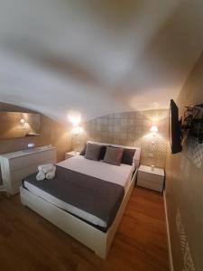 A bed or beds in a room at O Vascetiello