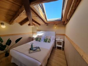 Ένα ή περισσότερα κρεβάτια σε δωμάτιο στο Apartamentos San Isidro