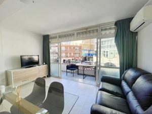 TV a/nebo společenská místnost v ubytování APARTMENT IN BENIDORM CITY CENTER