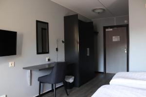 Hotell Tjamstan Malå客房内的一张或多张床位