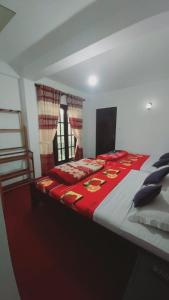 Tempat tidur dalam kamar di Green Gregory Villa Nuwara Eliya