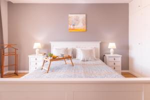 Postel nebo postele na pokoji v ubytování Maria Casa Branca by ALMA Holiday Rentals
