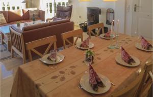 a dining room table with plates of food on it at Beautiful Home In Quesada-Rojales in Rojales