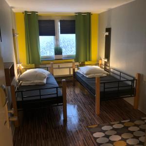 Postel nebo postele na pokoji v ubytování Backpackers Düsseldorf - SELF CHECK-IN