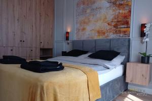 Posteľ alebo postele v izbe v ubytovaní Apartament Amber - AZW Gdańsk