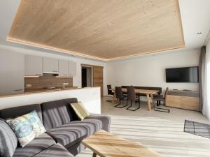 TV a/nebo společenská místnost v ubytování Gästehaus Sonne