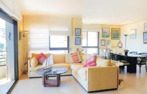 a living room with a couch and a table at Nice Apartment In Tossa De Mar in Tossa de Mar